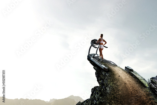 Woman running on a treadmill concept