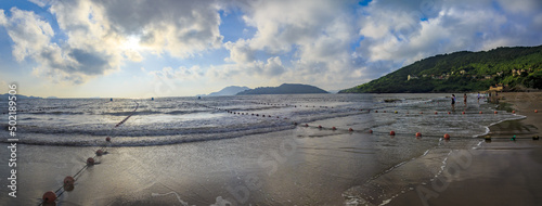 Chinese fishing village of emperor city beach photo