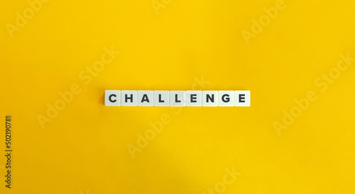 Challenge Word on Letter Tiles on Yellow Background. Minimal Aesthetics.