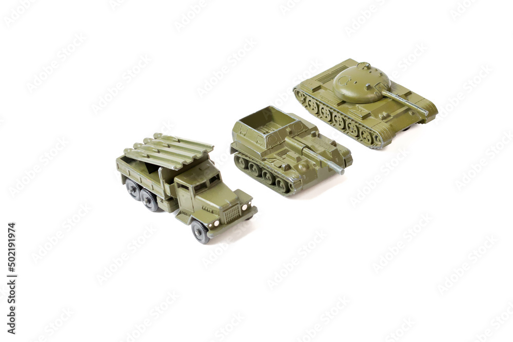 Fototapeta premium World war II toy tank, armored personnel carriers are isolate on white background. Retro model of military equipment. Guards mortar.