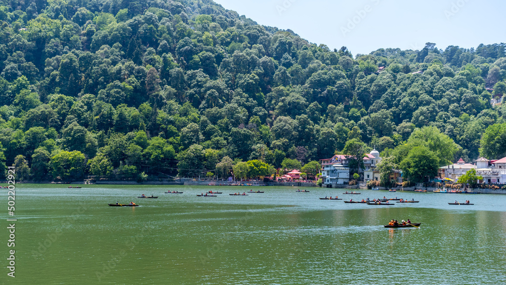 View of Nainital Lake, Naina Devi Temple and mountains are in the background, Nainital, Uttarakhand, India View of Nainital Lake, Naina Devi Temple and mountains are in the background, Nainital, Uttarakhand, India