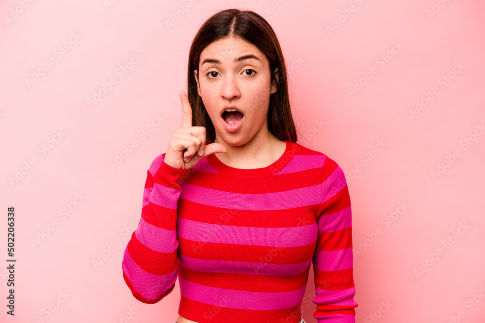 Young caucasian woman isolated on pink background having an idea, inspiration concept. Young caucasian woman isolated on pink background having an idea, inspiration concept.