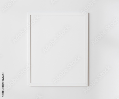 White blank frame on white wall mockup, 4:5 ratio - 40x50 cm, 16 x 20 inches, poster frame mockup, 3d rendering