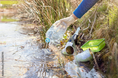 Photography Environmental conservation collecting garbage and trash from water