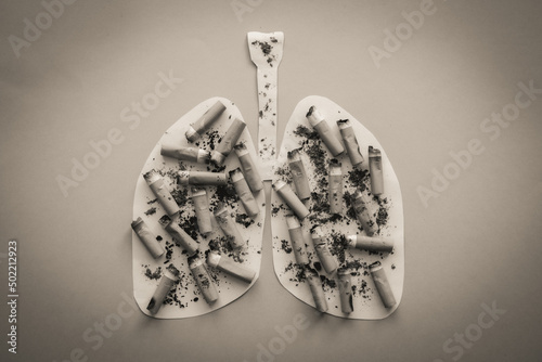 Fototapeta Naklejka Na Ścianę i Meble -  No tobacco day. Lungs image with butts cigarettes and Ash from cigarette or cigar smoke. Copy space