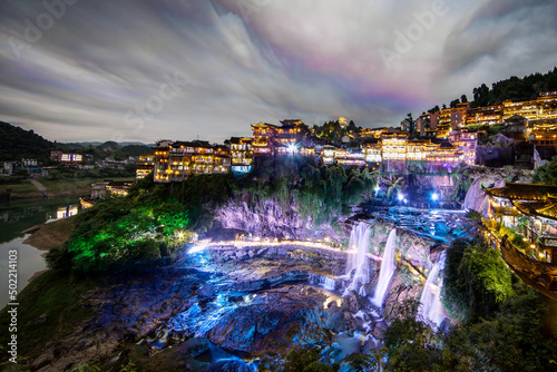 ancient city Furong town at night with Colorful neon lights