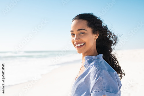Portrait of natural beauty woman at beach photo