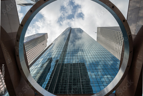 Looking up skyscraper through circle architecture in downtown Houston, Texas