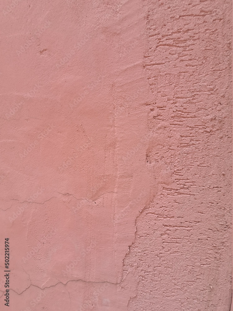 Old painted pink color vintage wall texture background
