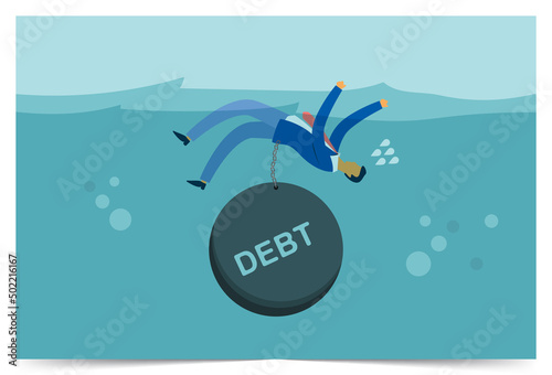 Businessman drowning with debt