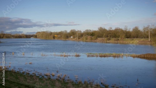 The flooded river valley (Seacourt Stream) next to the A34 main road in Oxford photo