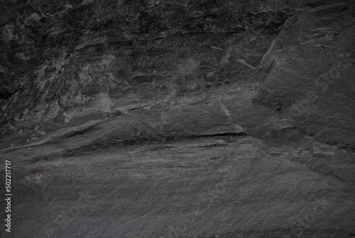 Dark grey black slate background or texture.