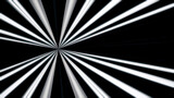 Abstract background of white rays. Striped moving background of black and white stripes emerging from one point like spotlight