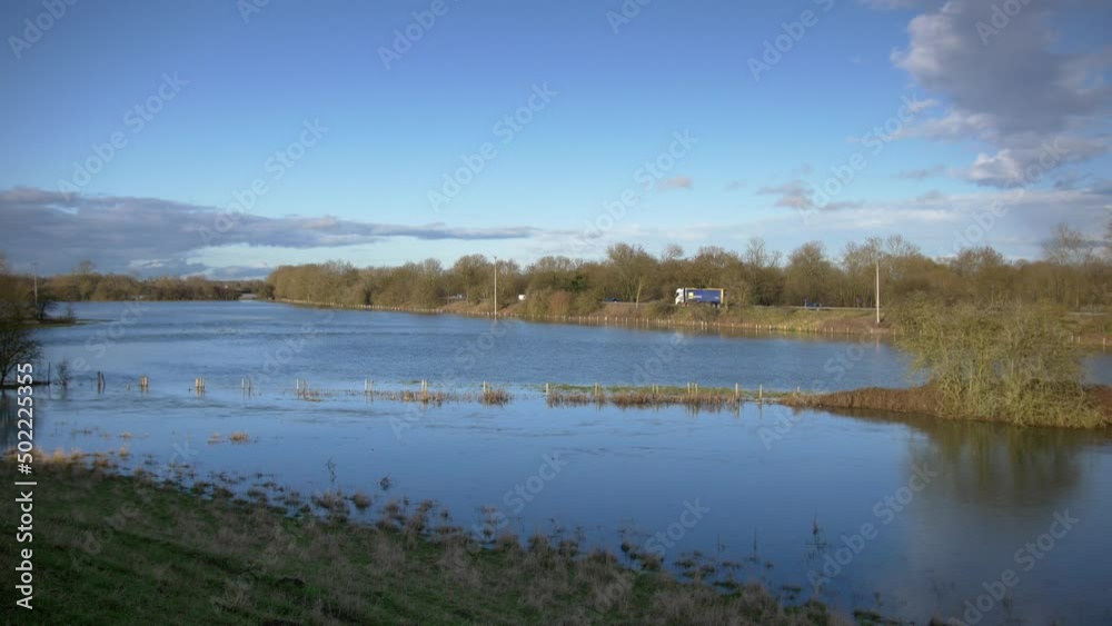The flooded river valley (Seacourt Stream) next to the A34 main road in Oxford The flooded river valley (Seacourt Stream) next to the A34 main road in Oxford