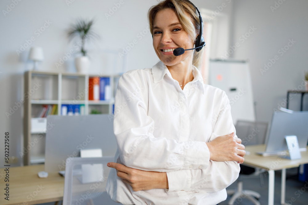 Portrait of smiling female support center operator at office Portrait of smiling female support center operator at office