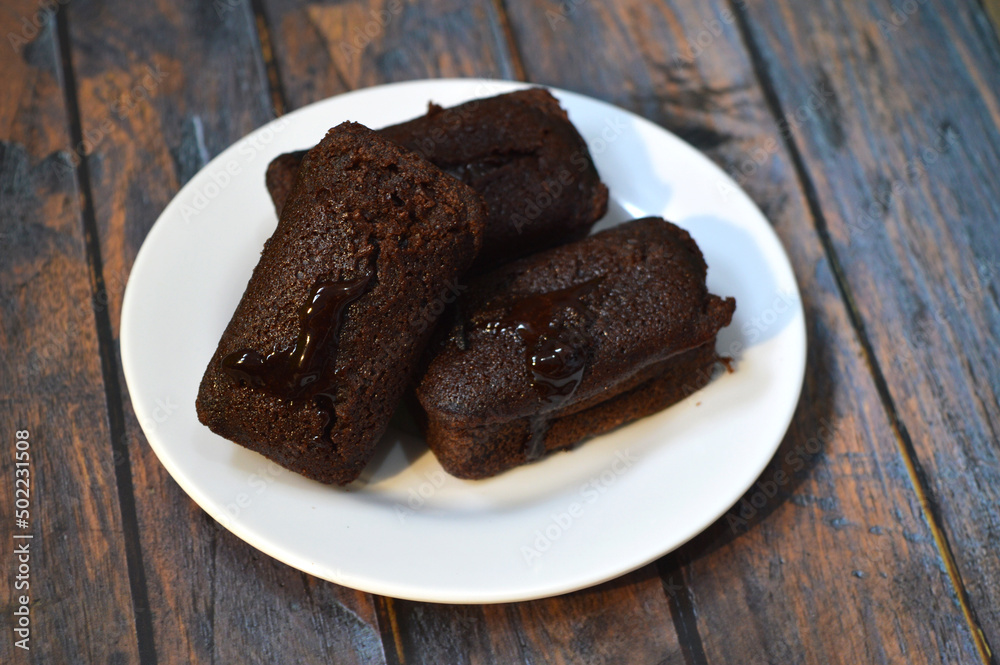 Chocolate block cake is a traditional cake made from flour, vanilla, eggs, sweetened condensed milk, baking soda, margarine and sugar Chocolate block cake is a traditional cake made from flour, vanilla, eggs, sweetened condensed milk, baking soda, margarine and sugar