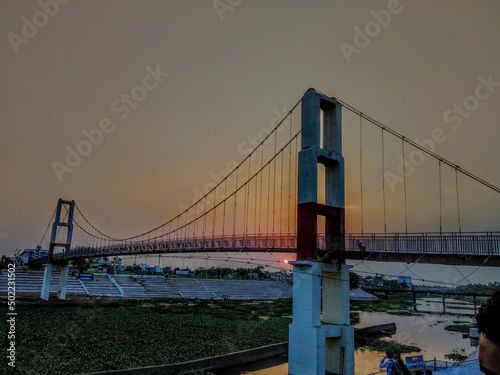 Bridge at sunset © Vinayak