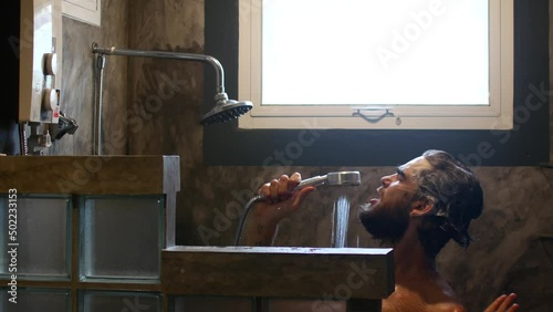 A man takes a shower and singing