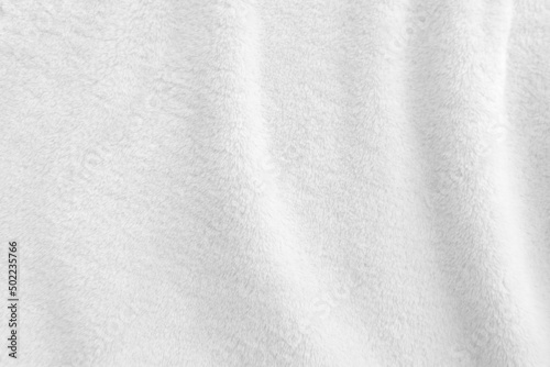 White clean wool texture background. light natural sheep wool. white seamless cotton. texture of fluffy fur for designers. close-up fragment white wool carpet.