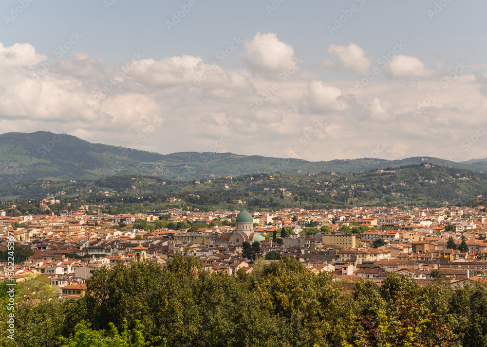 panoramic view of city of Florence with green cupola of synagogue 