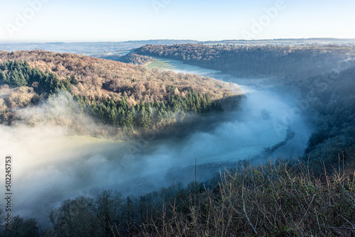 The River Wye obscured by mist due to a temperature inversion, seen from the viewpoint of Symonds Yat Rock, Herefordshire, England UK