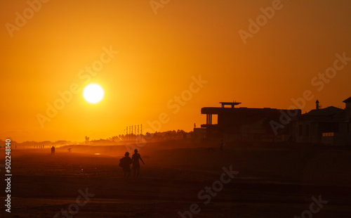 Long shot of a sunset beach