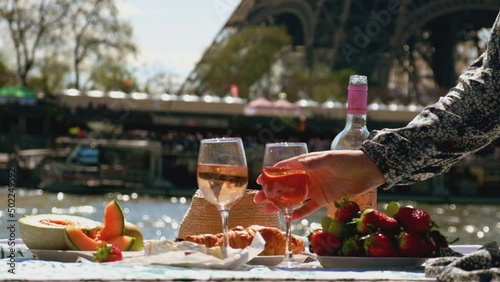 Woman in paris picnic with wine. Selective focus. photo