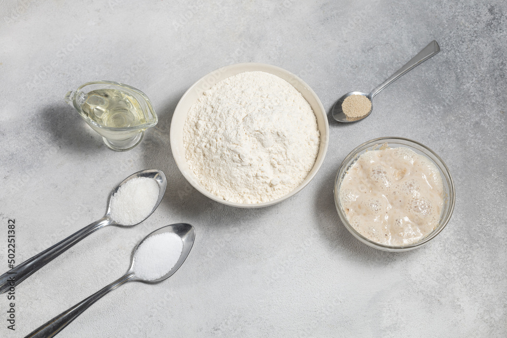Ingredients for baking bread on a light background Ingredients for baking bread on a light background