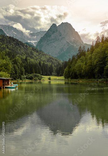Forest lake and mountains in Bavaria. German Alps in summer, landscape photo