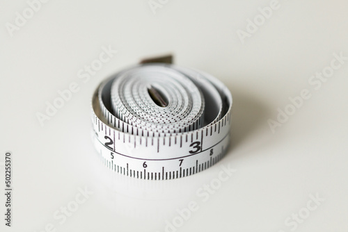 sewing tape measure on white copy space photo