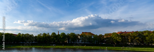 Panorama of clouds over the city, evening sky, spring thunderclouds