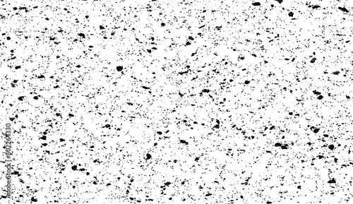 Small uneven spots and particles of debris. Abstract vector texture. Distressed uneven background. Grunge texture overlay with fine grains isolated on white background. Vector illustration. EPS10.