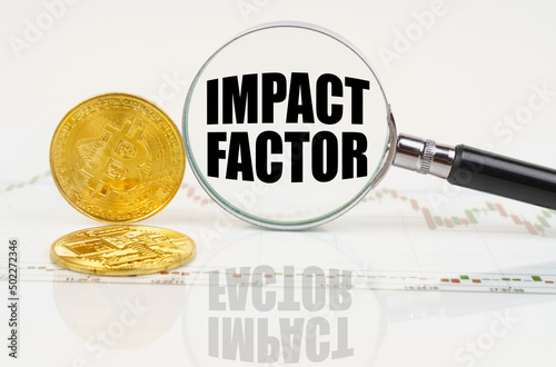 There are bitcoins on the chart and there is a magnifying glass with the inscription - IMPACT FACTOR