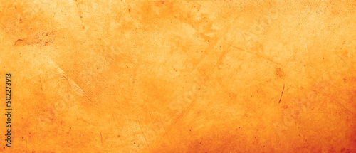 Orange textured concrete wall background photo