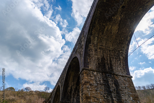 The Victorian Midland Railway Headstone Viaduct, now part of the Monsal Trail cycleway, in Monsal Dale in England's Peak District National Park. photo