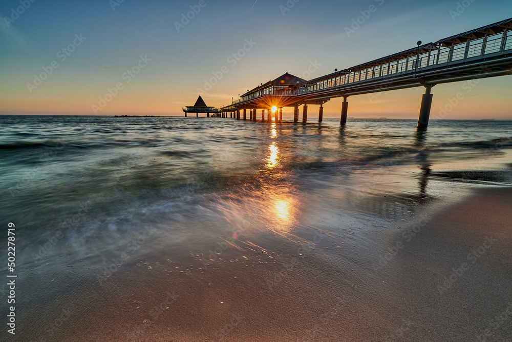 Fototapeta premium tourist attraction pier of Heringsdorf on island of Usedom at baltic sea in the morning