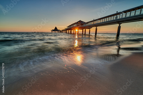 tourist attraction pier of Heringsdorf on island of Usedom at baltic sea in the morning