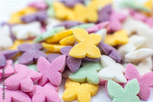 Colorful butterflies, pastel colored sugar confectionery sprinkles