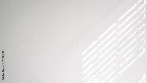 Shadow background. Sunlight architecture abstract background with light, black shadow overlay from window on white texture wall. Product presentation, backdrop and mockup, summer seasonal concept. photo