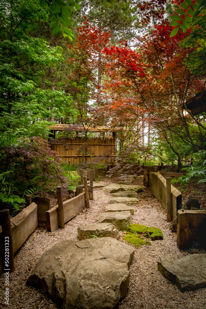 Traditional Japanese garden whose design is based on Japanese aesthetics and philosophical ideas, avoiding artificial ornaments and emphasizing natural views Traditional Japanese garden whose design is based on Japanese aesthetics and philosophical ideas, avoiding artificial ornaments and emphasizing natural views
