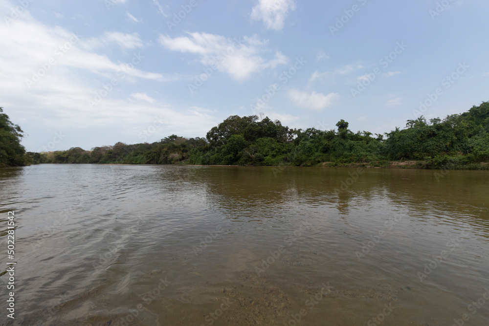 Amazing view of Colombian palomino river located in Guajira Department with blue sky