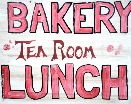 Bakery tea room lunch sign outdoors.
