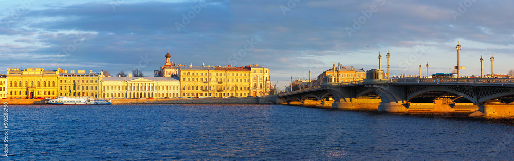 Panoramic view Neva river in Saint Petersburg, Russia. Blagoveshchensky Bridge and English Embankment on sunset