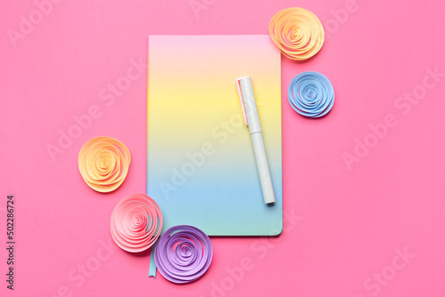 Notebook, pen and paper flo...