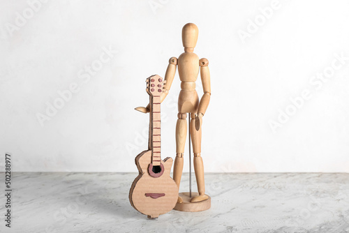 Wooden mannequin with cardb...