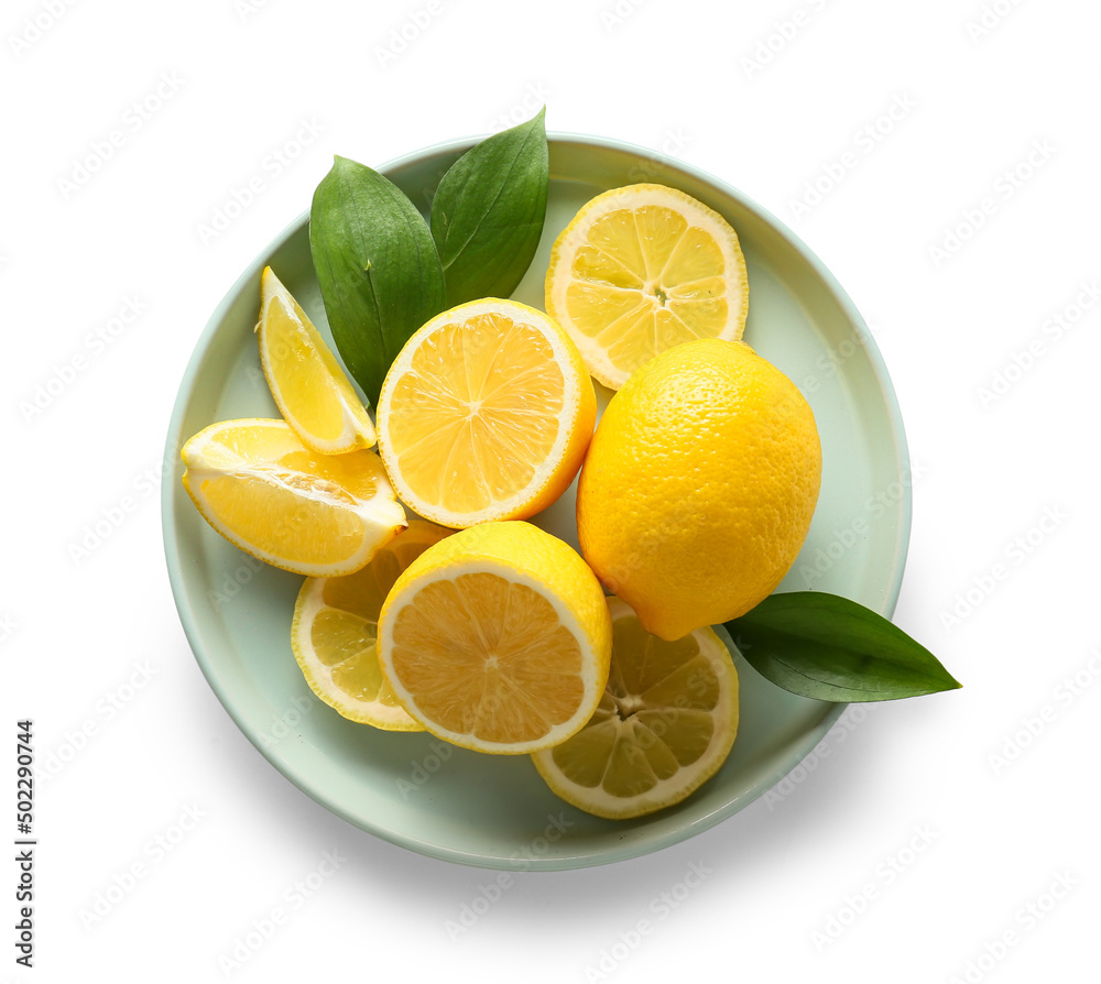 Plate with lemon slices with leaves on white background Plate with lemon slices with leaves on white background