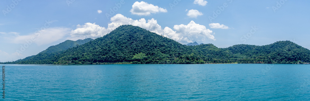 Mountains and jungle of Koh Chang island in eastern Thailand from an approaching boat