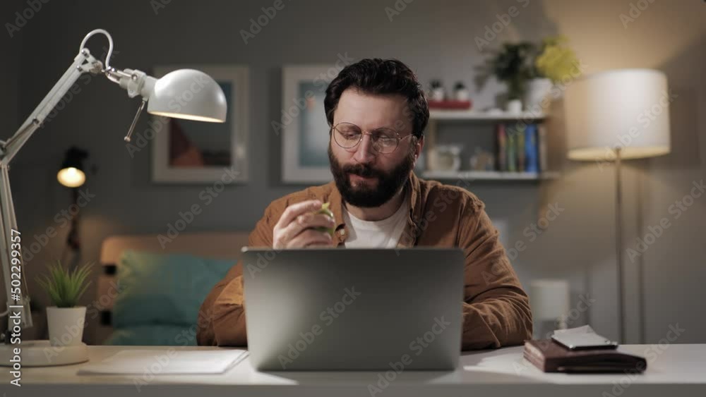 Toothache, pain in tooth. Bearded man in glasses has toothache after eating food Toothache, pain in tooth. Bearded man in glasses has toothache after eating food