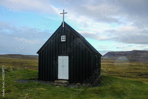 A little black church near the road in Iceland.