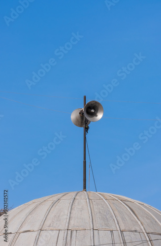 Announcement loudspeaker on a lead plated dome photo